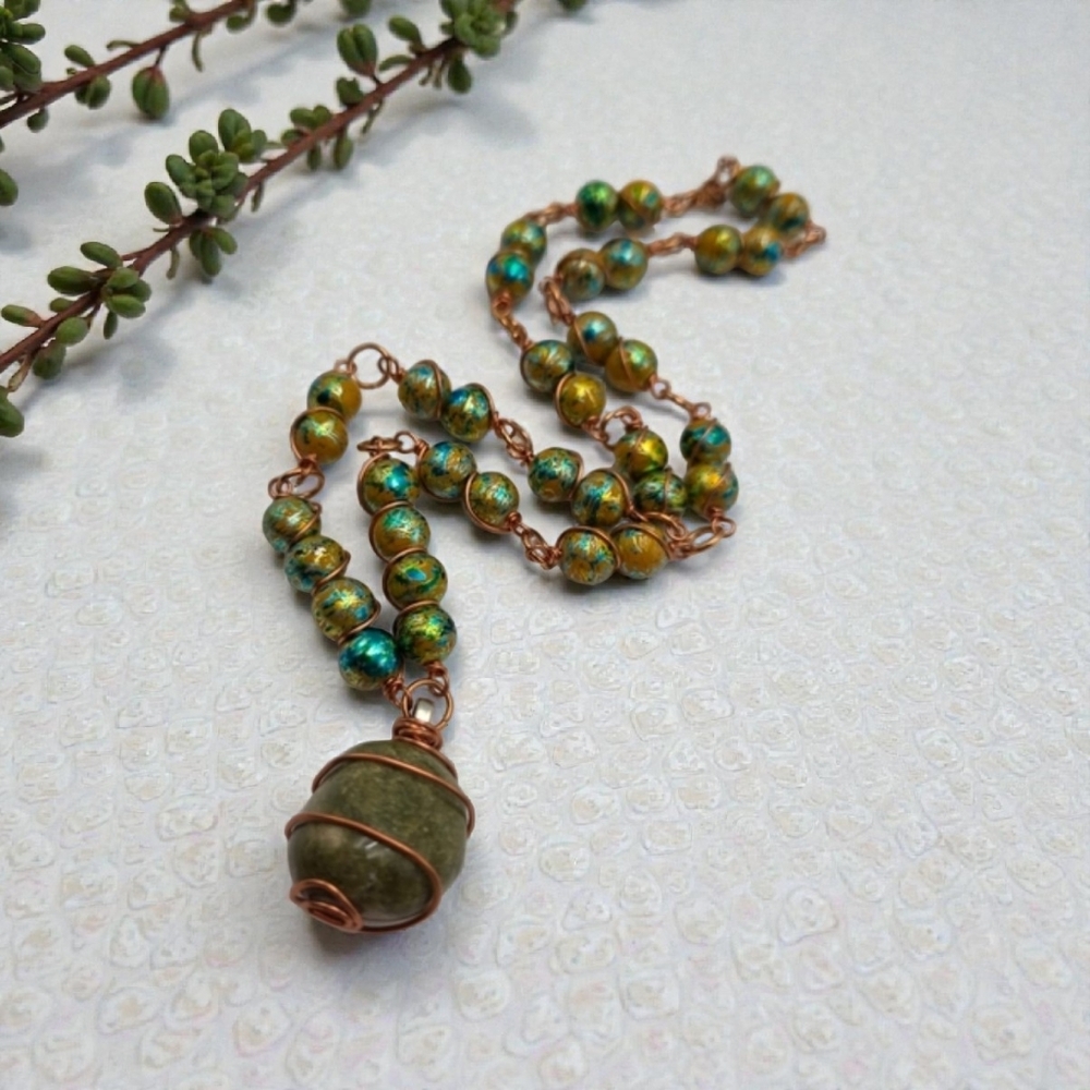 Handcrafted Beaded Necklace with Green and Gold Accents and Moss Agate Pendant